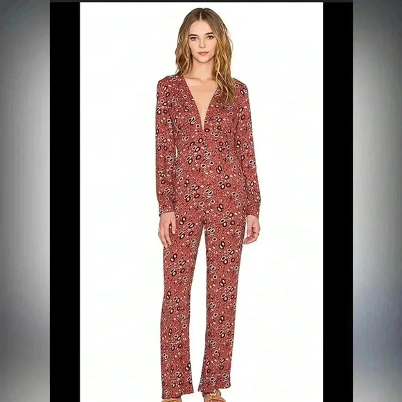 Free People Some Like it Hot Jumpsuit in Rust Combo
Size 4 - Picture 1 of 4